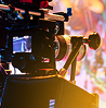 Film shoot in progress with professional lighting and cameras
